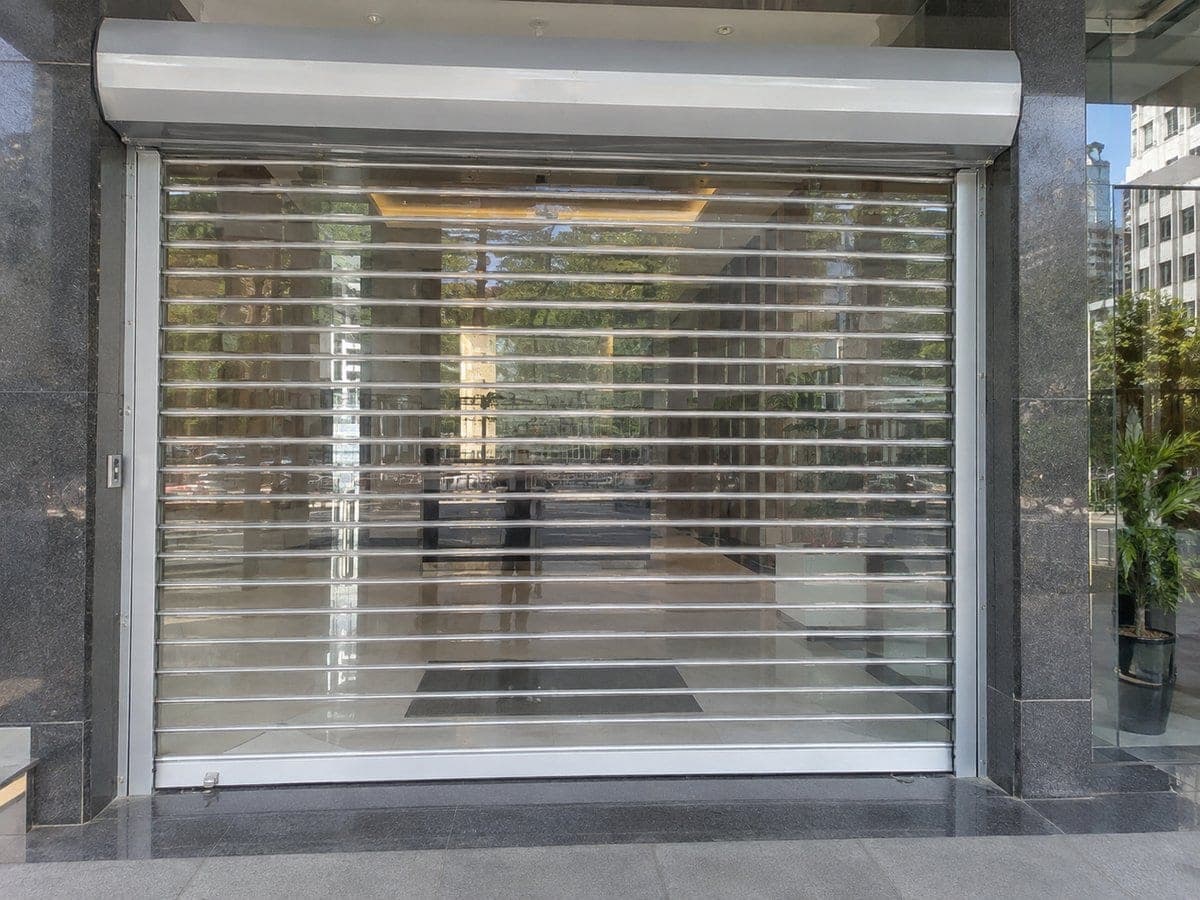 Transparent motorized elevation shutters